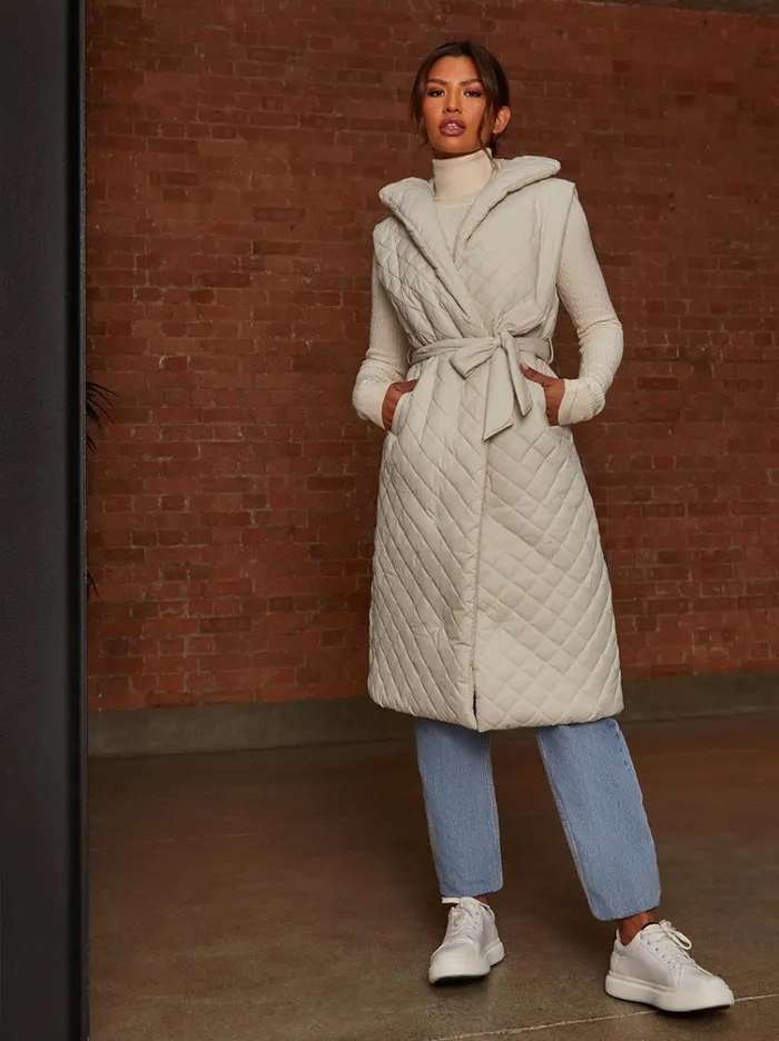 Chi Chi London Diamond Quilted Longline Belted Gilet In Cream Women Winterwear