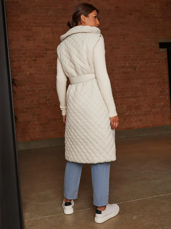 Chi Chi London Diamond Quilted Longline Belted Gilet In Cream Women Winterwear
