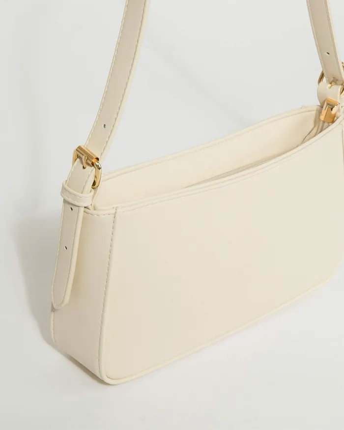 Colette By Colette Hayman Ivory Frankie Buckle Strap Shoulder Bags Shoulder Bags