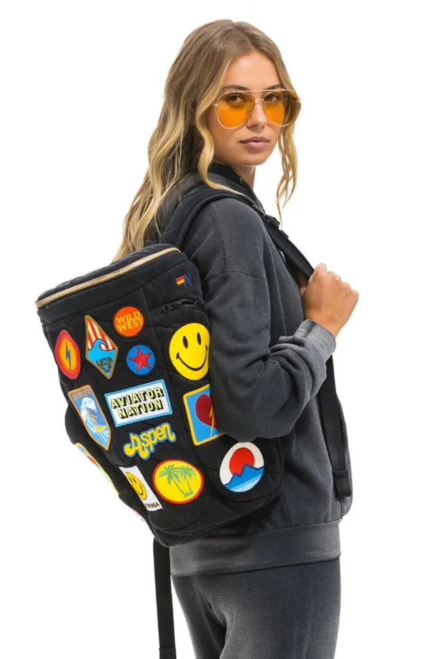 VINTAGE PATCH DENIM PUFFER BACKPACK 8211 VINTAGE BLACK WomenMen Aviator Nation Backpacks VINTAGE PATCH DENIM PUFFER BACKPACK 8211 VINTAGE BLACK WomenMen Aviator Nation Backpacks